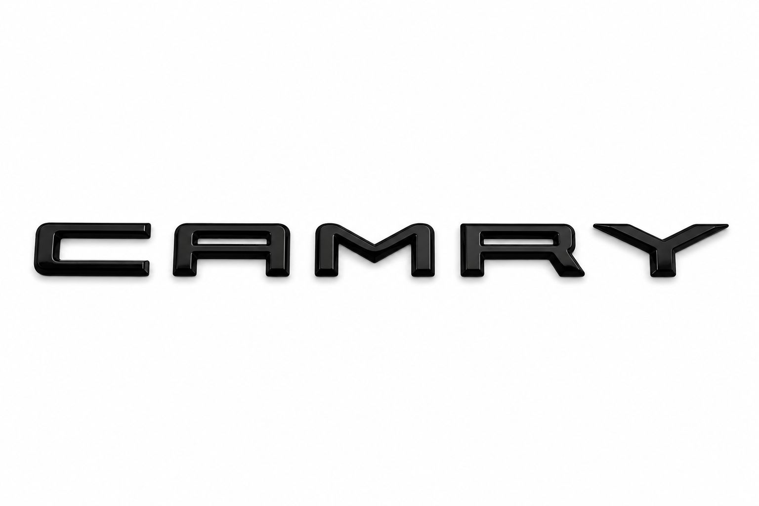 PHOTO-2026-09-11-20-41-48 2 Camry Emblem (word black)– شعار كامري لون أسود - الصورة 1